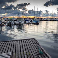 SOZOPOL, BULGARIA - JULY 12, 2016: Sunset at the port of Sozopol, Burgas Region, Bulgaria