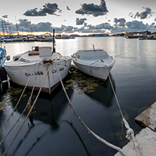 SOZOPOL, BULGARIA - JULY 12, 2016: Sunset at the port of Sozopol, Burgas Region, Bulgaria