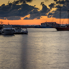 SOZOPOL, BULGARIA - JULY 12, 2016: Sunset at the port of Sozopol, Burgas Region, Bulgaria