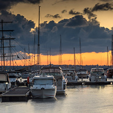 SOZOPOL, BULGARIA - JULY 12, 2016: Sunset at the port of Sozopol, Burgas Region, Bulgaria