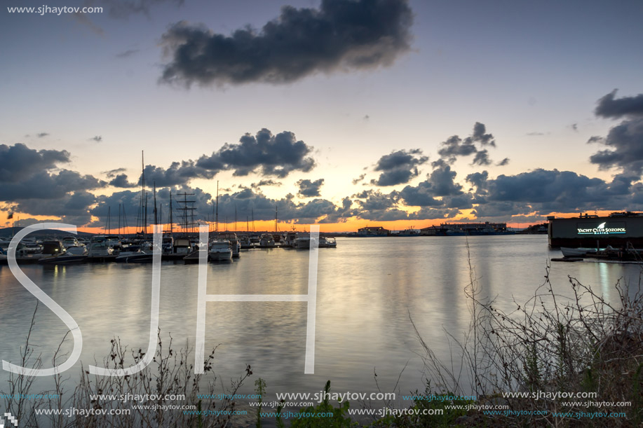 SOZOPOL, BULGARIA - JULY 12, 2016: Sunset at the port of Sozopol, Burgas Region, Bulgaria