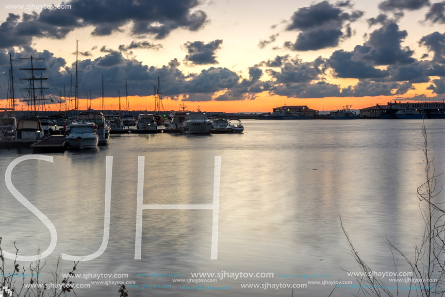 SOZOPOL, BULGARIA - JULY 12, 2016: Sunset at the port of Sozopol, Burgas Region, Bulgaria