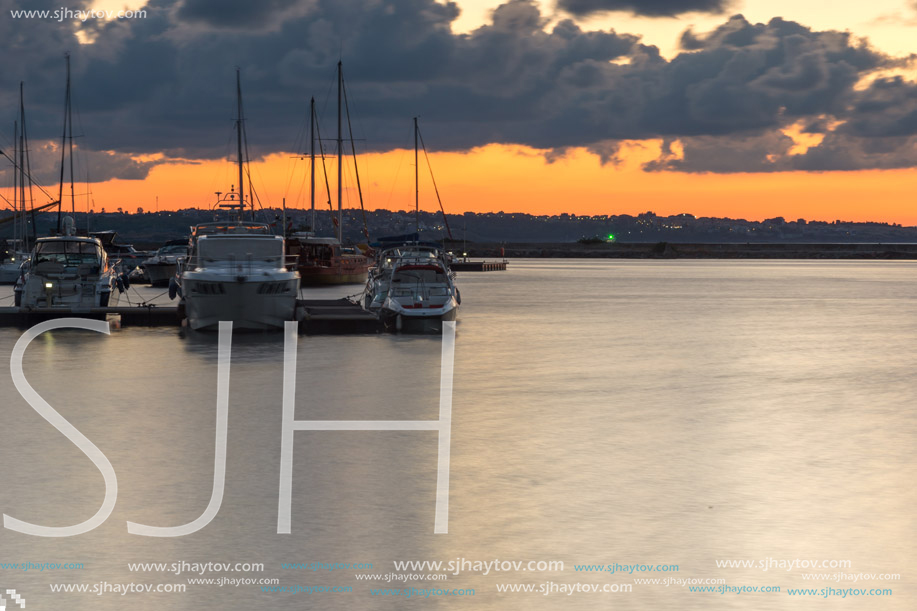 SOZOPOL, BULGARIA - JULY 12, 2016: Sunset at the port of Sozopol, Burgas Region, Bulgaria