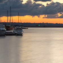 SOZOPOL, BULGARIA - JULY 12, 2016: Sunset at the port of Sozopol, Burgas Region, Bulgaria