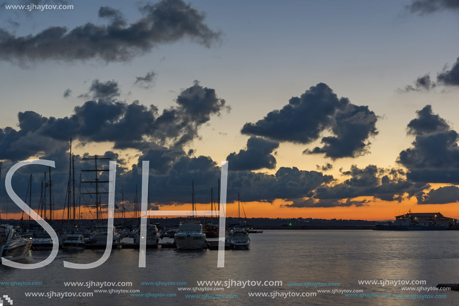 SOZOPOL, BULGARIA - JULY 12, 2016: Sunset at the port of Sozopol, Burgas Region, Bulgaria