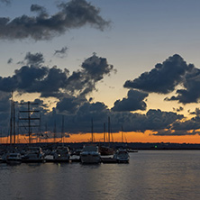 SOZOPOL, BULGARIA - JULY 12, 2016: Sunset at the port of Sozopol, Burgas Region, Bulgaria