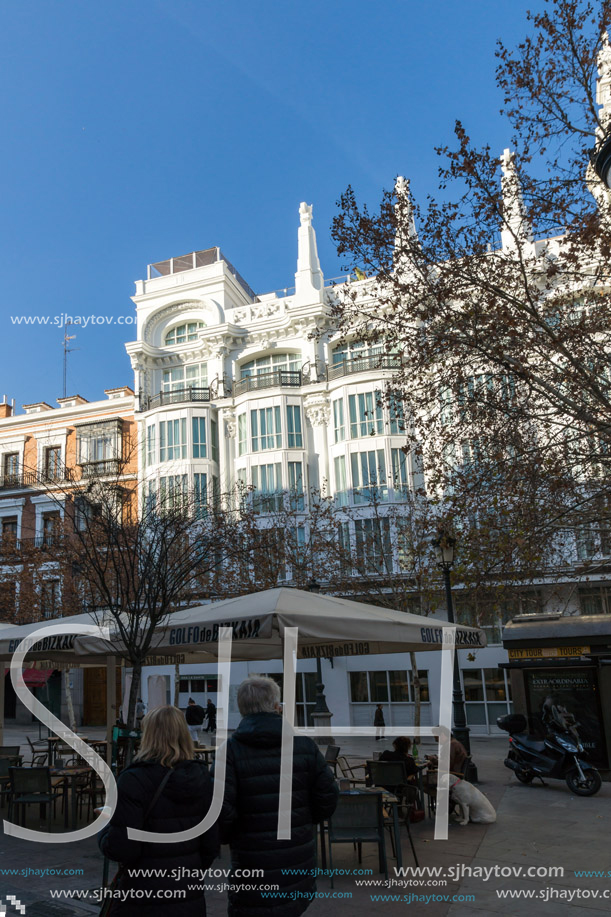 MADRID, SPAIN - JANUARY 23, 2018: Facade of typical Buildings and streets in City of Madrid, Spain