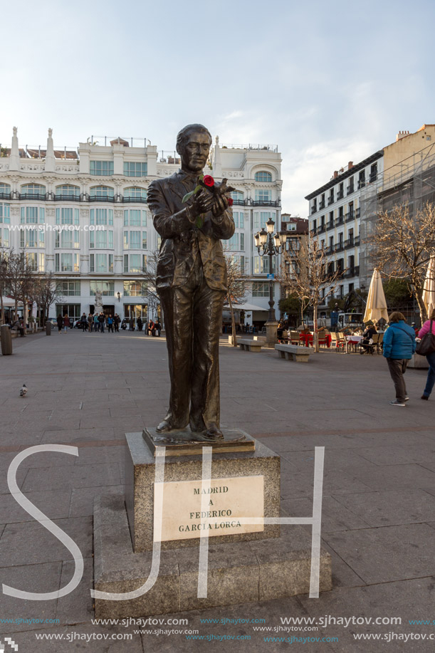 MADRID, SPAIN - JANUARY 23, 2018: Sunset view of Monument of Federico Garcia Lorca at Plaza Santa Ana in City of Madrid, Spain