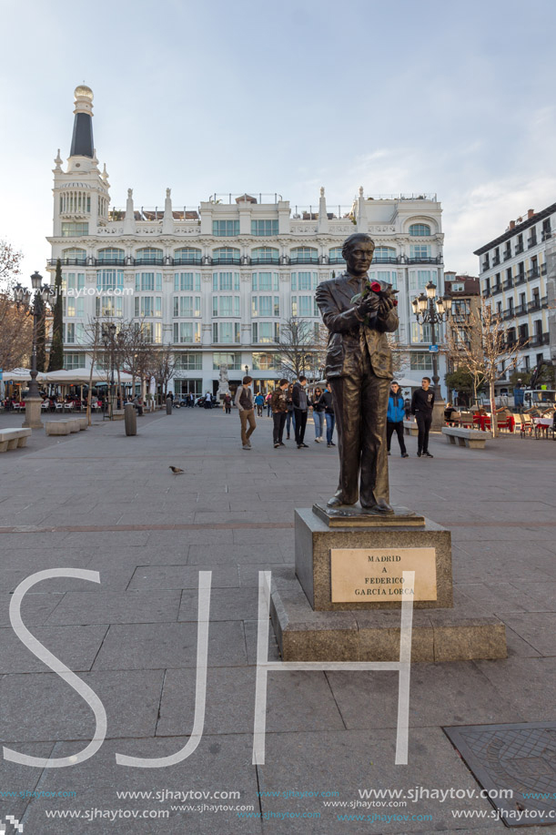 MADRID, SPAIN - JANUARY 23, 2018: Sunset view of Monument of Federico Garcia Lorca at Plaza Santa Ana in City of Madrid, Spain