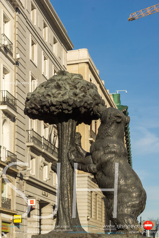 MADRID, SPAIN - JANUARY 23, 2018:  Statue of the Bear and the Strawberry Tree at Puerta del Sol in Madrid, Spain