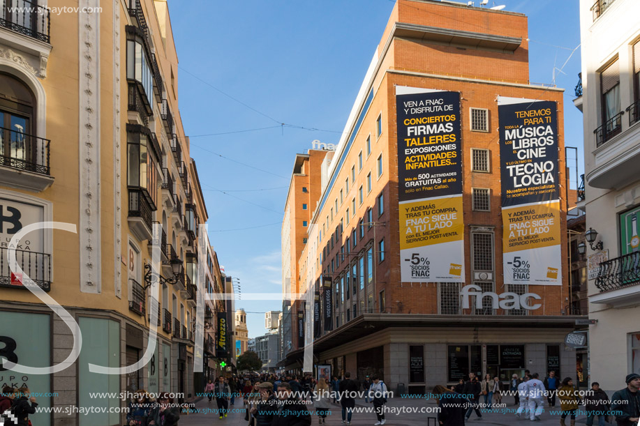 MADRID, SPAIN - JANUARY 23, 2018: Facade of typical Buildings and streets in City of Madrid, Spain