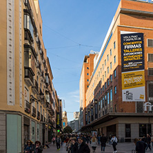 MADRID, SPAIN - JANUARY 23, 2018: Facade of typical Buildings and streets in City of Madrid, Spain