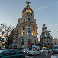 MADRID, SPAIN - JANUARY 23, 2018:  Sunset view of Gran Via and Metropolis Building (Edificio Metropolis) in City of Madrid, Spain