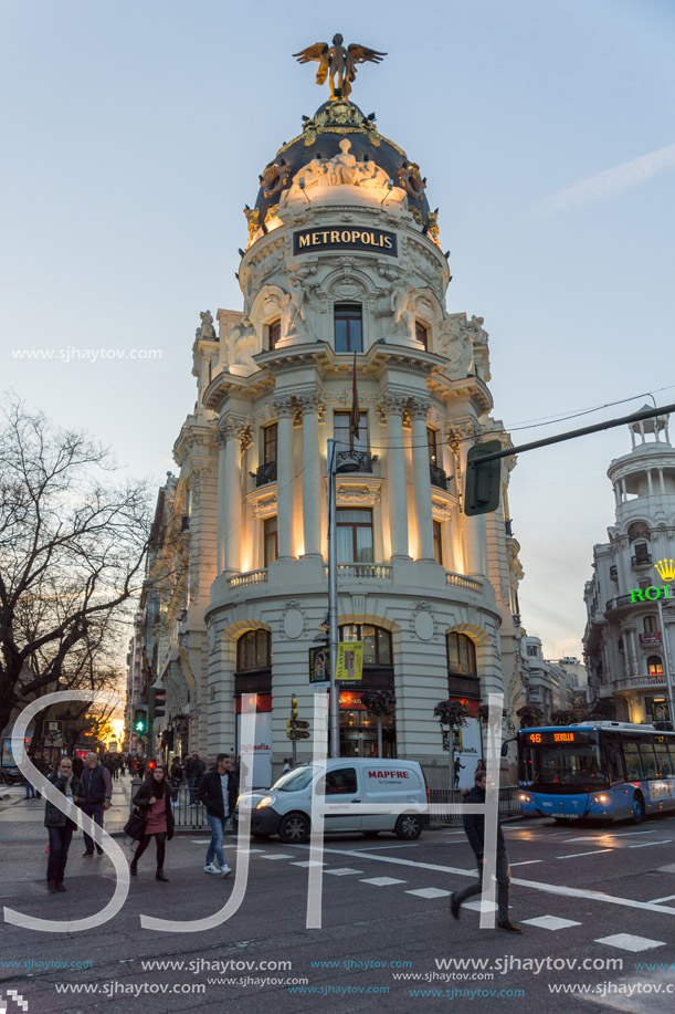 MADRID, SPAIN - JANUARY 23, 2018:  Sunset view of Gran Via and Metropolis Building (Edificio Metropolis) in City of Madrid, Spain