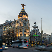 MADRID, SPAIN - JANUARY 23, 2018:  Sunset view of Gran Via and Metropolis Building (Edificio Metropolis) in City of Madrid, Spain