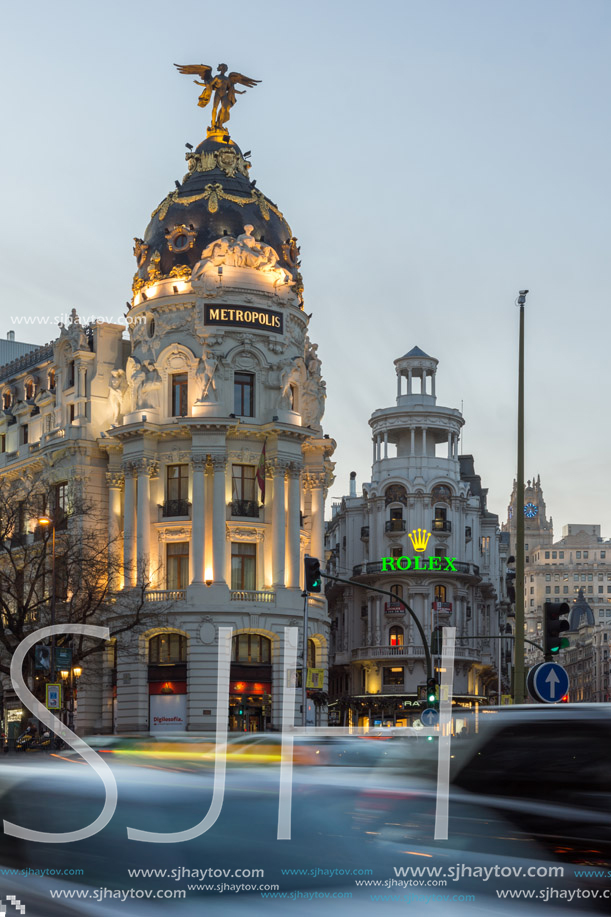 MADRID, SPAIN - JANUARY 23, 2018:  Sunset view of Gran Via and Metropolis Building (Edificio Metropolis) in City of Madrid, Spain