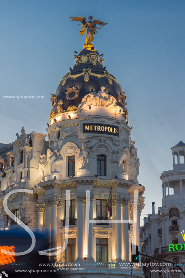 MADRID, SPAIN - JANUARY 23, 2018:  Sunset view of Gran Via and Metropolis Building (Edificio Metropolis) in City of Madrid, Spain