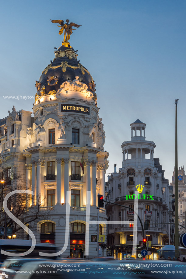 MADRID, SPAIN - JANUARY 23, 2018:  Sunset view of Gran Via and Metropolis Building (Edificio Metropolis) in City of Madrid, Spain