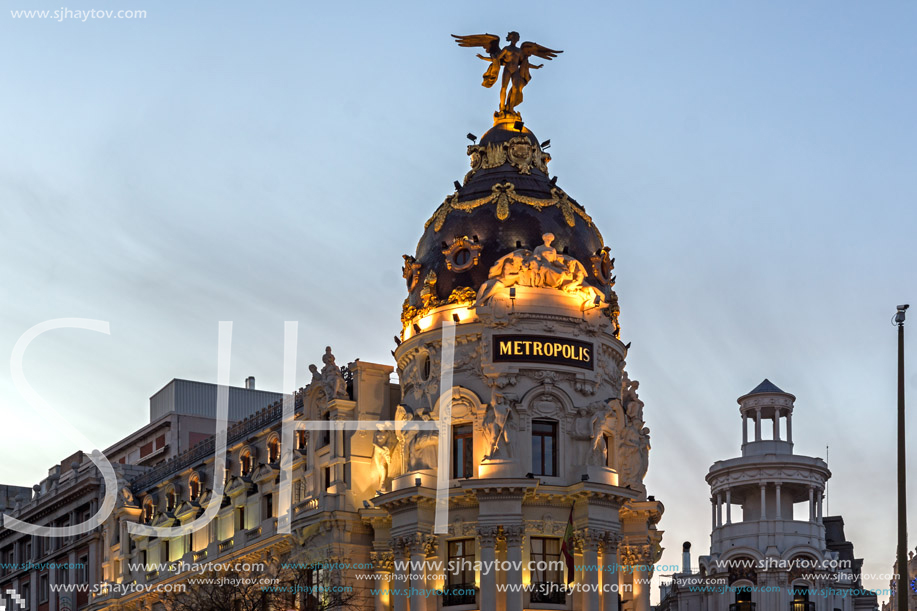 MADRID, SPAIN - JANUARY 23, 2018:  Sunset view of Gran Via and Metropolis Building (Edificio Metropolis) in City of Madrid, Spain