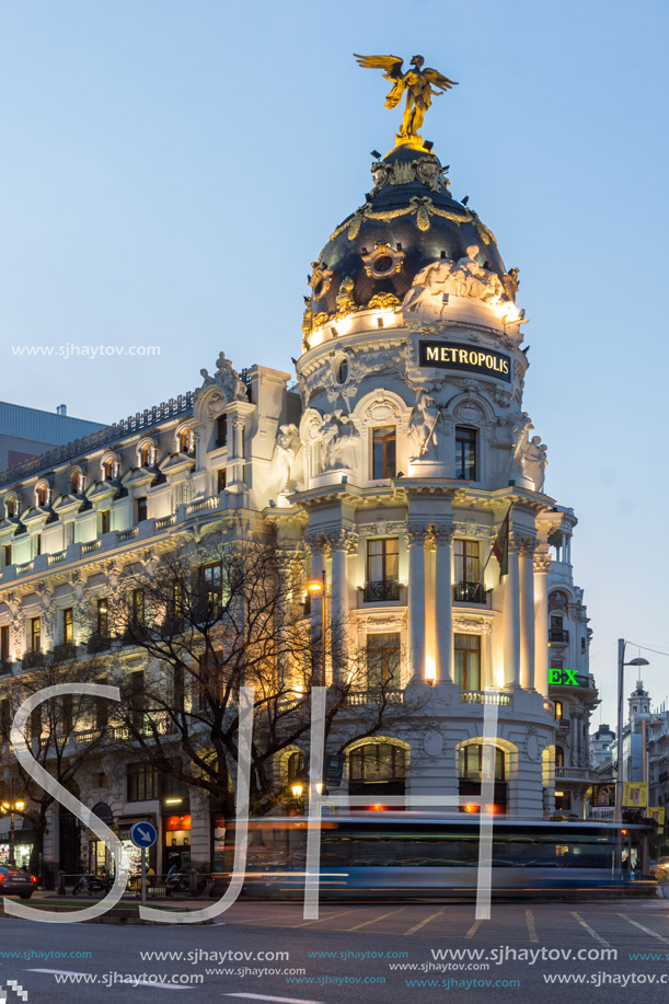 MADRID, SPAIN - JANUARY 23, 2018:  Sunset view of Gran Via and Metropolis Building (Edificio Metropolis) in City of Madrid, Spain