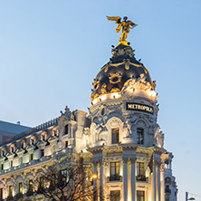 MADRID, SPAIN - JANUARY 23, 2018:  Sunset view of Gran Via and Metropolis Building (Edificio Metropolis) in City of Madrid, Spain