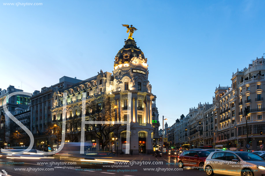 MADRID, SPAIN - JANUARY 23, 2018:  Sunset view of Gran Via and Metropolis Building (Edificio Metropolis) in City of Madrid, Spain