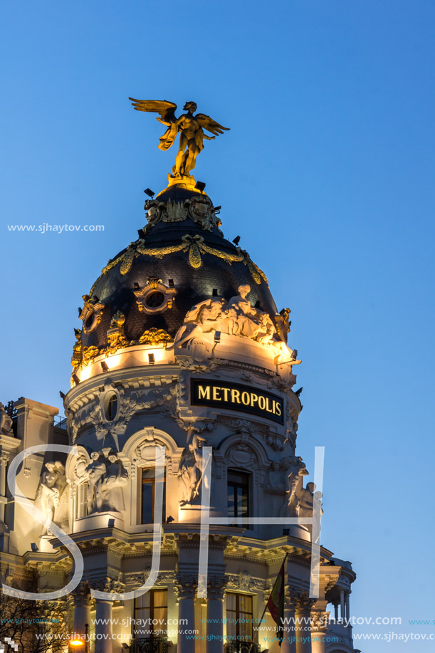 MADRID, SPAIN - JANUARY 23, 2018:  Sunset view of Gran Via and Metropolis Building (Edificio Metropolis) in City of Madrid, Spain