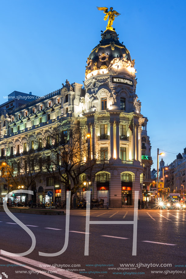 MADRID, SPAIN - JANUARY 23, 2018:  Sunset view of Gran Via and Metropolis Building (Edificio Metropolis) in City of Madrid, Spain