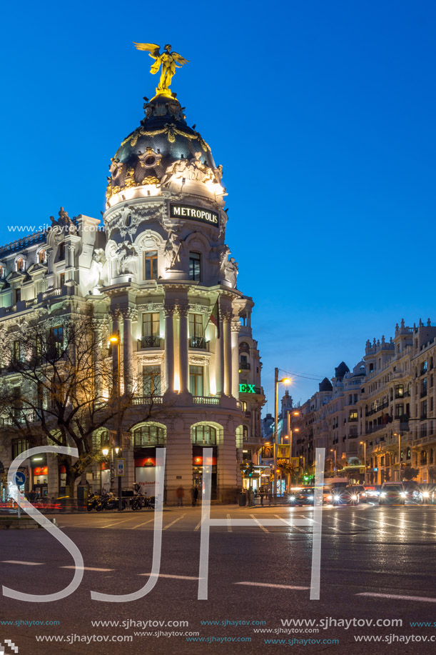 MADRID, SPAIN - JANUARY 23, 2018:  Sunset view of Gran Via and Metropolis Building (Edificio Metropolis) in City of Madrid, Spain