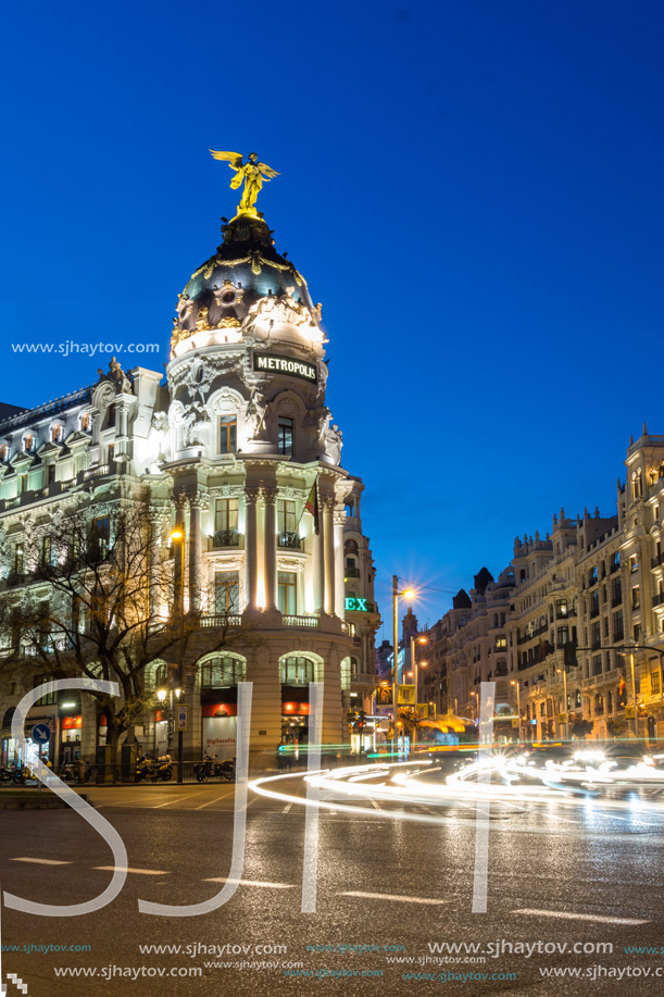 MADRID, SPAIN - JANUARY 23, 2018:  Sunset view of Gran Via and Metropolis Building (Edificio Metropolis) in City of Madrid, Spain