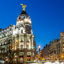 MADRID, SPAIN - JANUARY 23, 2018:  Sunset view of Gran Via and Metropolis Building (Edificio Metropolis) in City of Madrid, Spain