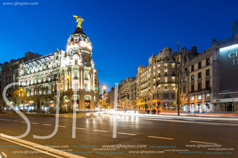 MADRID, SPAIN - JANUARY 23, 2018:  Sunset view of Gran Via and Metropolis Building (Edificio Metropolis) in City of Madrid, Spain