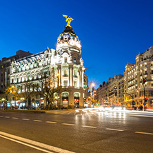 MADRID, SPAIN - JANUARY 23, 2018:  Sunset view of Gran Via and Metropolis Building (Edificio Metropolis) in City of Madrid, Spain