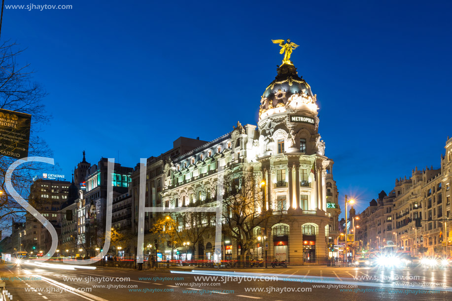 MADRID, SPAIN - JANUARY 23, 2018:  Sunset view of Gran Via and Metropolis Building (Edificio Metropolis) in City of Madrid, Spain