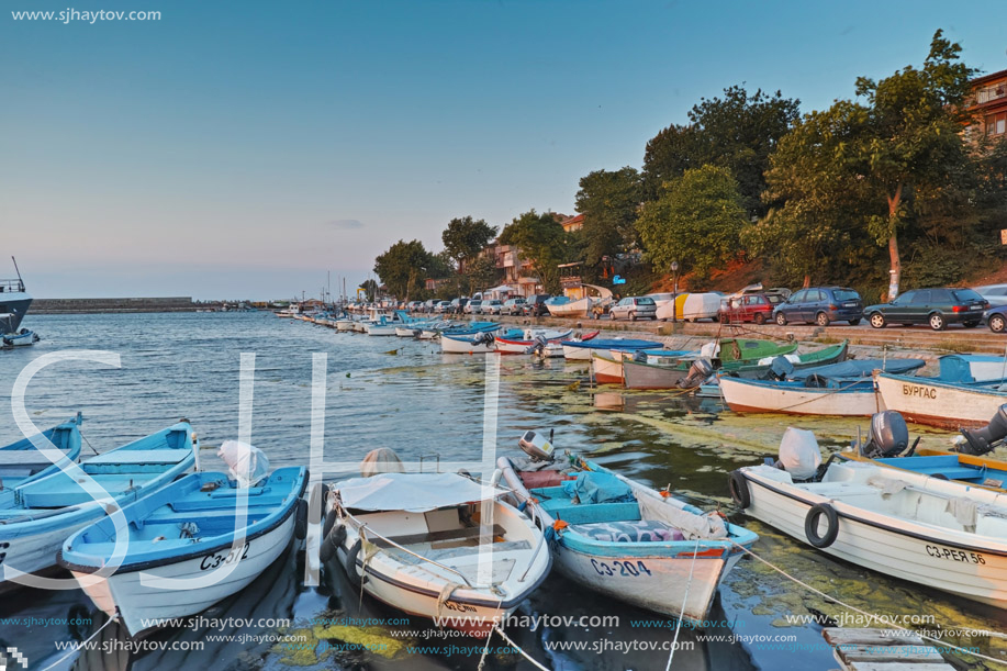 SOZOPOL, BULGARIA - JUNE 26, 2015: Sunset at the port of Sozopol, Burgas Region, Bulgaria