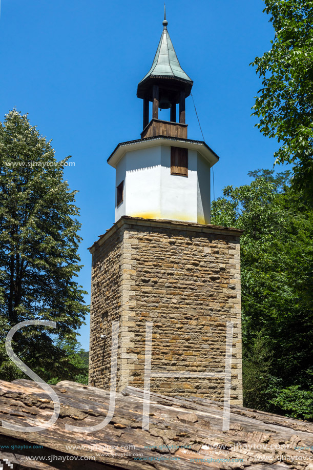 ETAR, GABROVO, BULGARIA- JULY 6, 2018: Clock tower in Architectural Ethnographic Complex Etar (Etara) near town of Gabrovo, Bulgaria