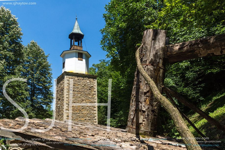 ETAR, GABROVO, BULGARIA- JULY 6, 2018: Clock tower in Architectural Ethnographic Complex Etar (Etara) near town of Gabrovo, Bulgaria