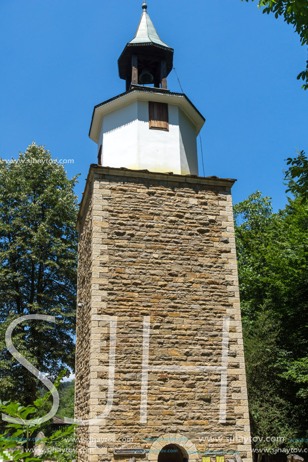 ETAR, GABROVO, BULGARIA- JULY 6, 2018: Clock tower in Architectural Ethnographic Complex Etar (Etara) near town of Gabrovo, Bulgaria