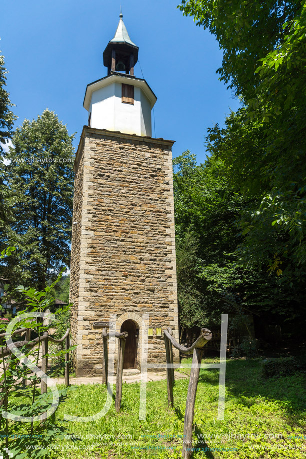 ETAR, GABROVO, BULGARIA- JULY 6, 2018: Clock tower in Architectural Ethnographic Complex Etar (Etara) near town of Gabrovo, Bulgaria