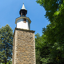 ETAR, GABROVO, BULGARIA- JULY 6, 2018: Clock tower in Architectural Ethnographic Complex Etar (Etara) near town of Gabrovo, Bulgaria