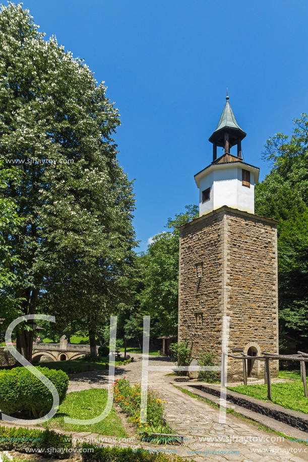 ETAR, GABROVO, BULGARIA- JULY 6, 2018: Clock tower in Architectural Ethnographic Complex Etar (Etara) near town of Gabrovo, Bulgaria