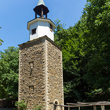 ETAR, GABROVO, BULGARIA- JULY 6, 2018: Clock tower in Architectural Ethnographic Complex Etar (Etara) near town of Gabrovo, Bulgaria