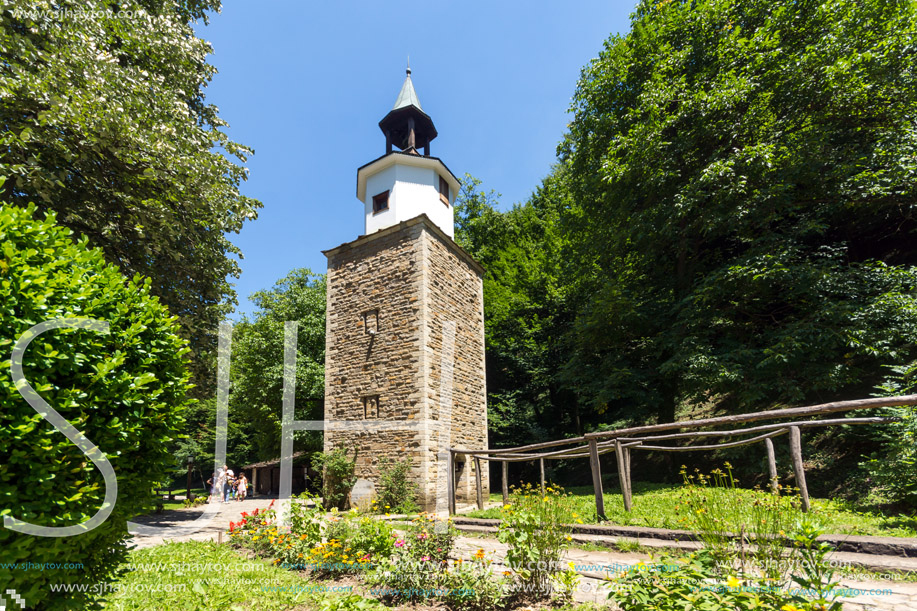 ETAR, GABROVO, BULGARIA- JULY 6, 2018: Clock tower in Architectural Ethnographic Complex Etar (Etara) near town of Gabrovo, Bulgaria