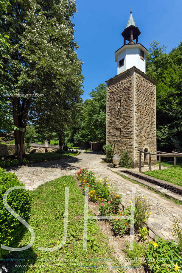 ETAR, GABROVO, BULGARIA- JULY 6, 2018: Clock tower in Architectural Ethnographic Complex Etar (Etara) near town of Gabrovo, Bulgaria