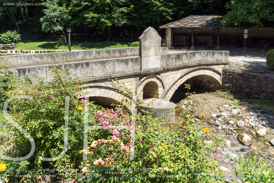 ETAR, GABROVO, BULGARIA- JULY 6, 2018: Old Stone bridge in Architectural Ethnographic Complex Etar (Etara) near town of Gabrovo, Bulgaria