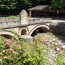 ETAR, GABROVO, BULGARIA- JULY 6, 2018: Old Stone bridge in Architectural Ethnographic Complex Etar (Etara) near town of Gabrovo, Bulgaria