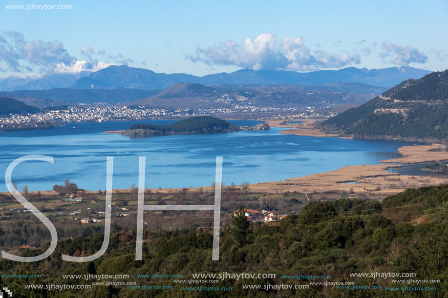 Amazing winter Landscape of Lake Pamvotida and Pindus mountain from city of Ioannina, Epirus, Greece