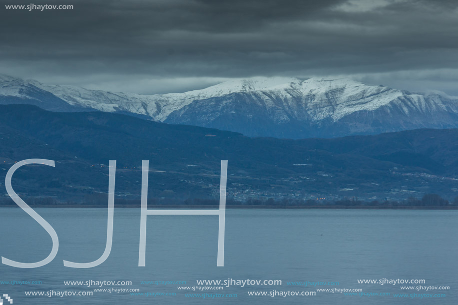 Amazing winter Landscape of Lake Pamvotida and Pindus mountain from city of Ioannina, Epirus, Greece