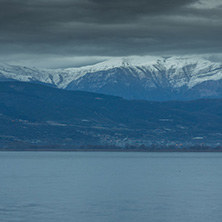 Amazing winter Landscape of Lake Pamvotida and Pindus mountain from city of Ioannina, Epirus, Greece