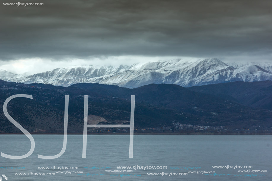 Amazing winter Landscape of Lake Pamvotida and Pindus mountain from city of Ioannina, Epirus, Greece